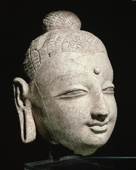 Head of a smiling Buddha, Greco-Buddhist style, from Afghanistan