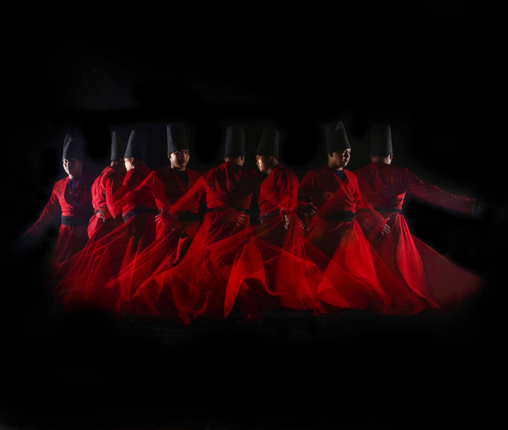 Sufi dancers in red von Agus Adriana