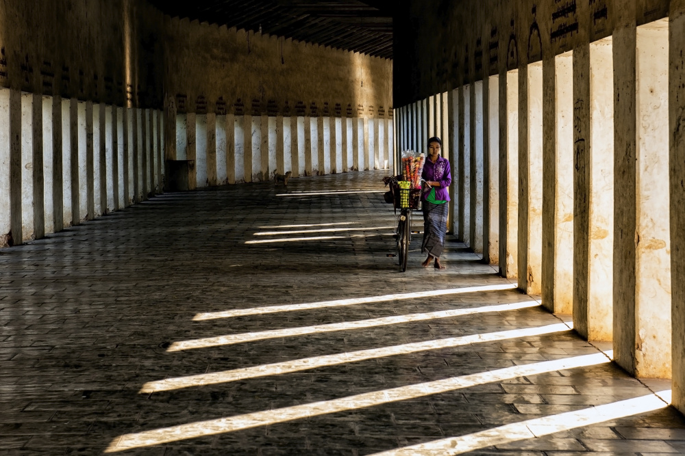 Woman with bike von Aharon Golani