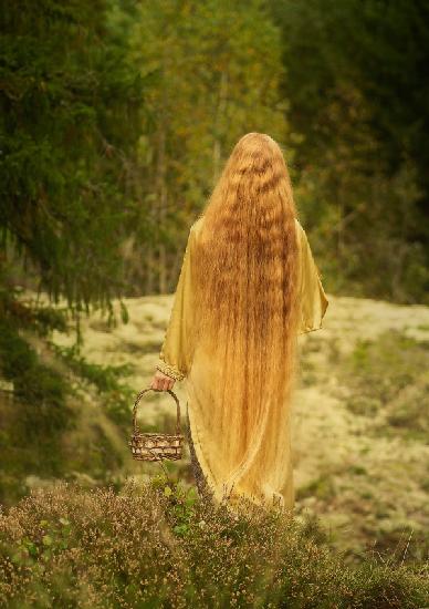 With a basket in her hand