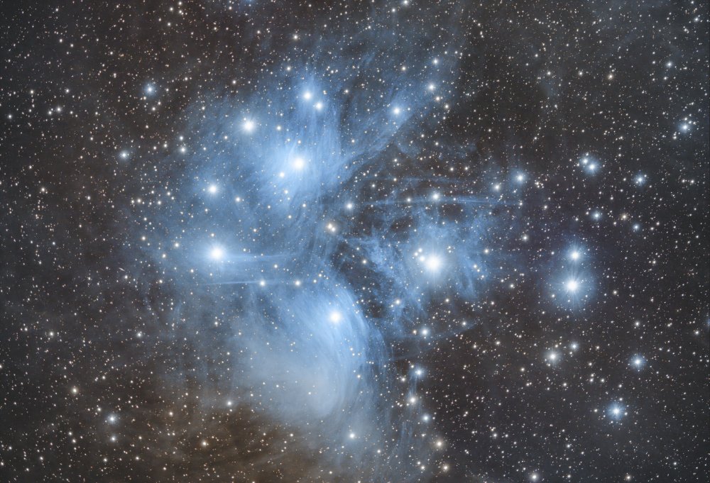 There Pleiades nebula von David Dayag