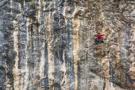 Man and stone wall