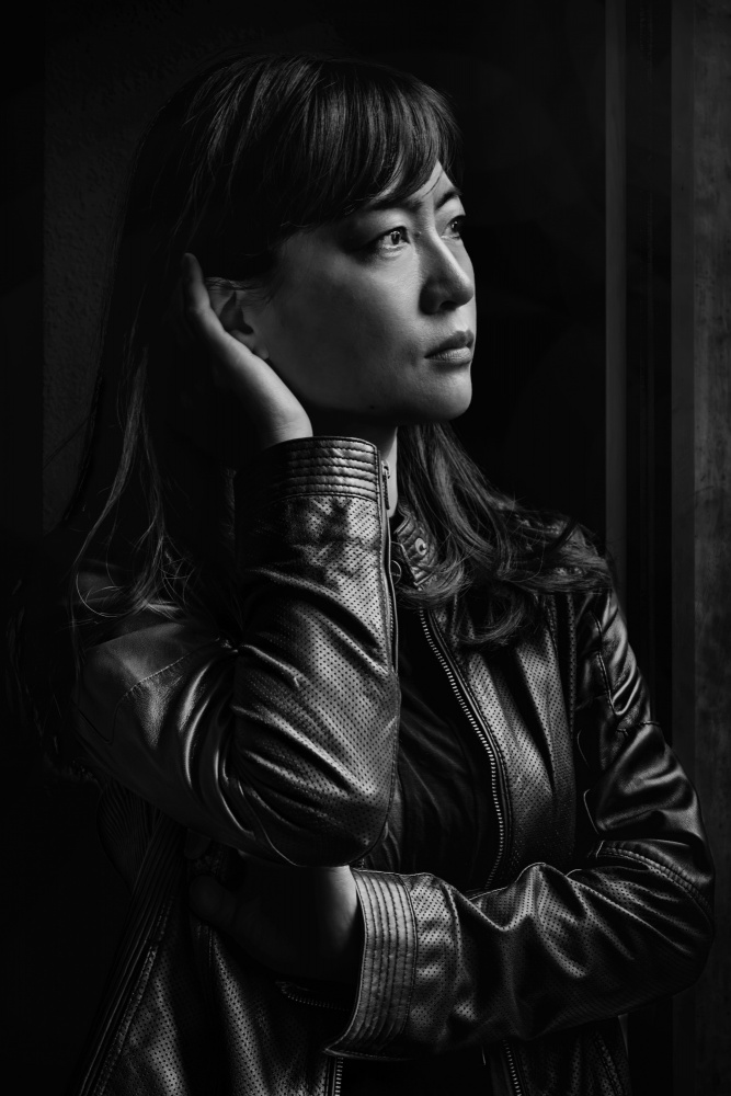 Woman in leather jacket von Eiji Yamamoto