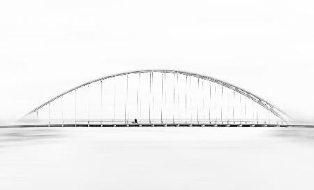 A Family Walking on Arch Bridge