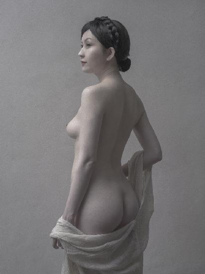 Nude showing back