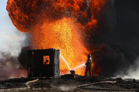 Oil fire lit by Islamic State