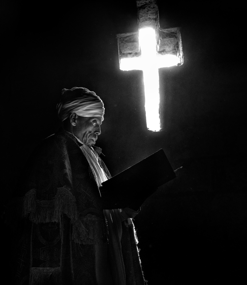 The priest, the book and the cross of light von Giovanni Cavalli