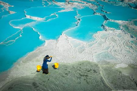 woman carrying water