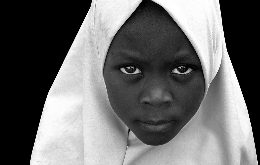 Intense look of a Zanzibar girl von Irene Perovich