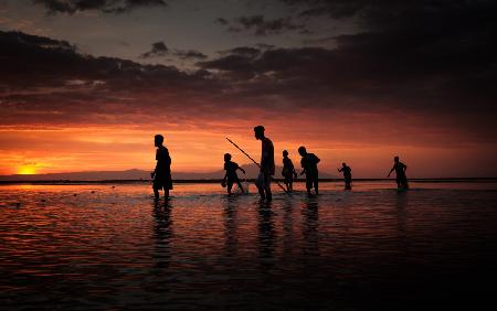 Fishing at sunset