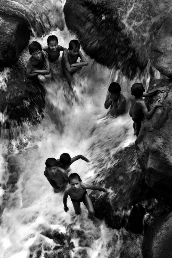 Children bathing in river von Johanes Januar