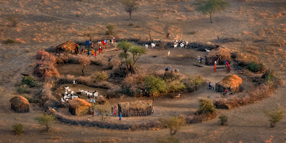 The Village of Maasai Mara von John J. Chen