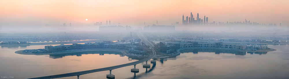 City in the morning mist von John J. Chen