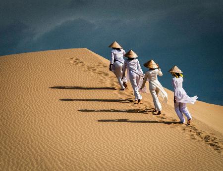 Walking up the sand dune