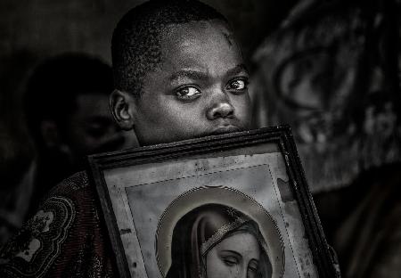 Ethiopian child in a religious ceremony.