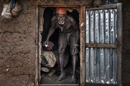 The village chief leaving his home - Benin