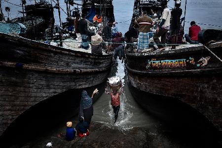 Woman begging for some fish-Bangladesh