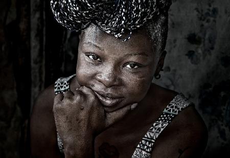 Woman with a gold tooth in the old Buduburam refugee camp - Ghana