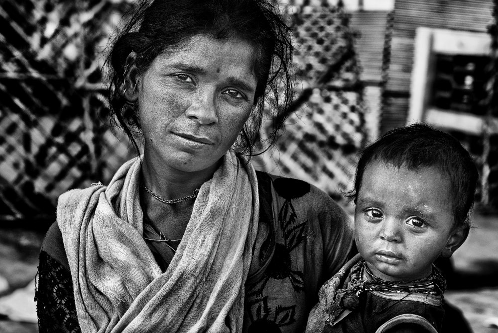 Indian mother and son. von Joxe Inazio Kuesta Garmendia