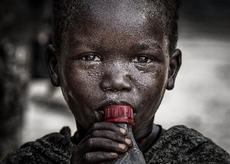 Child with a bottle - South Sudan