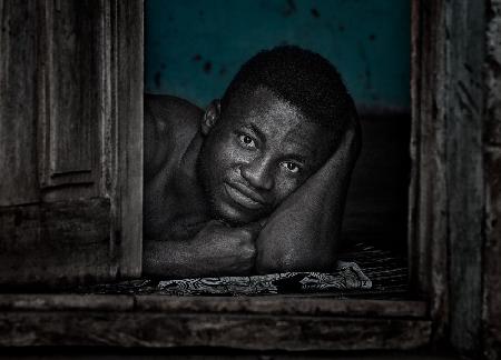 Man in his home - Ghana