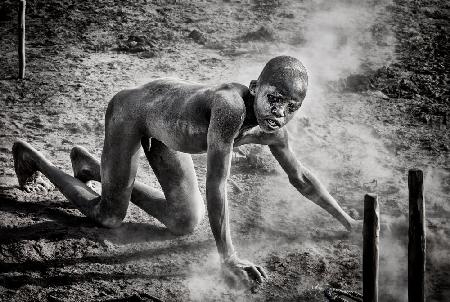 Collecting dung in a mundari cattle camp-II