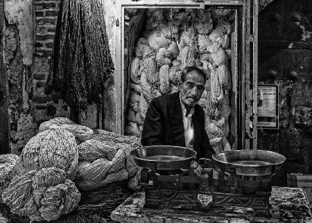 Rope seller in a bazaar (Iran)