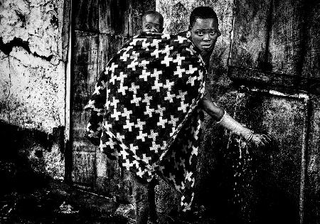 Suri tribe woman cleaning her ornaments - Ethiopia