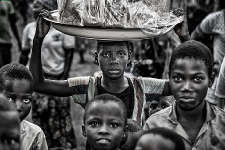 Selling in a market in Benin.