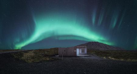 Volcanic cave over Auroras.