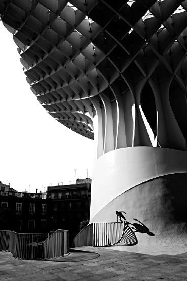 climbing over parasol