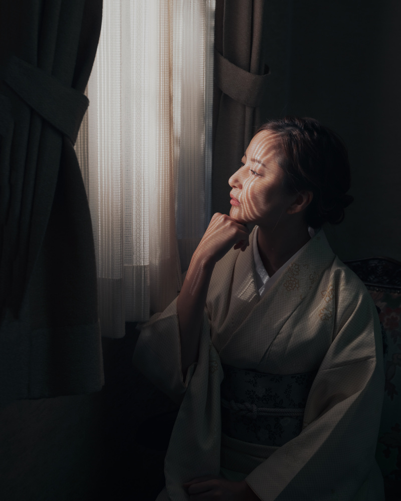 Woman lost in thought von Masayuki Kato