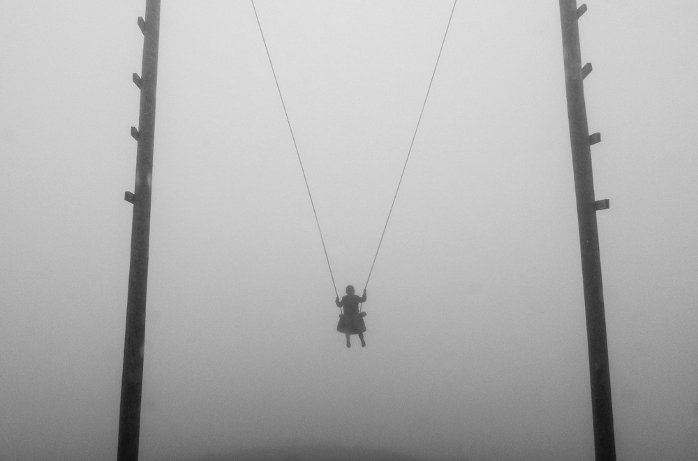 a boy on a swing von Meltem Cavusoglu