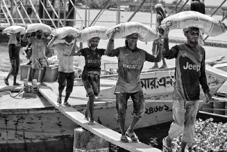 Unloading cement sacks