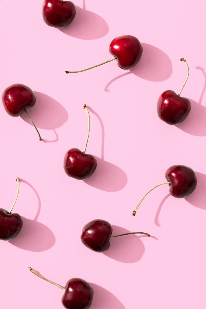 Cherries on pink background von Pictufy Studio III