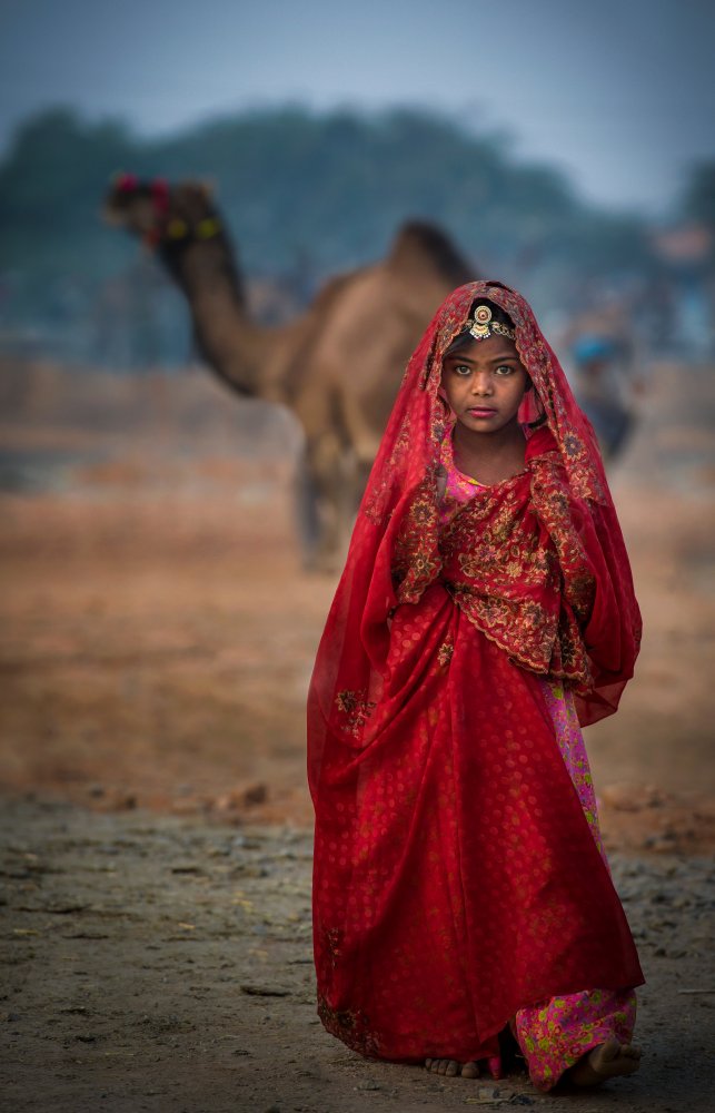 Nomad girl in red dress von Rana Jabeen