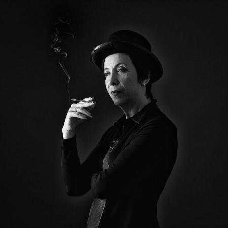 A woman with a cigarette.