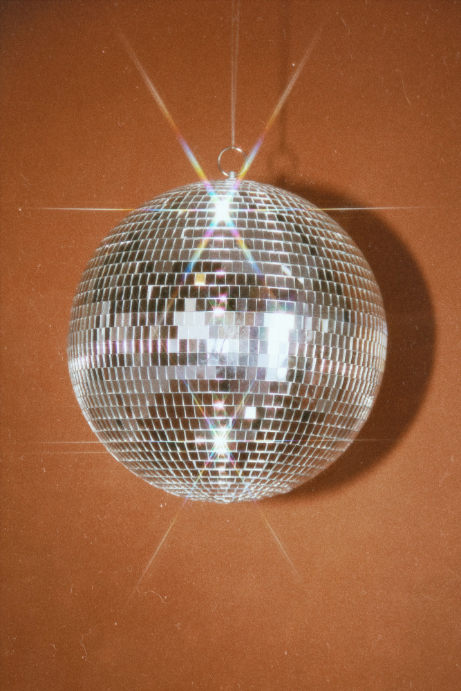 Orange Disco Ball von Samantha Hearn