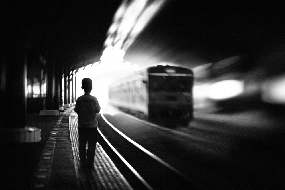 at the station series: 2/5. kid &amp; train von Sebastian Kisworo