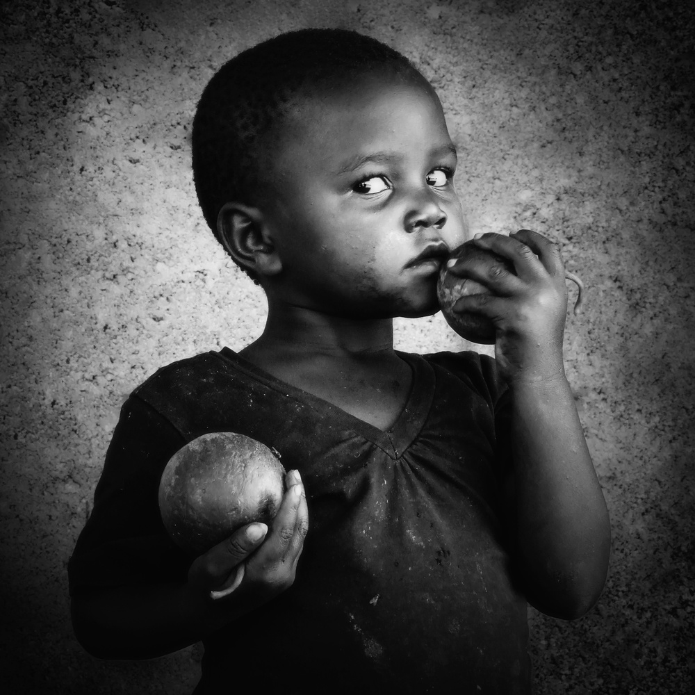 Little girl with pumpkins von Stanislav Kompas