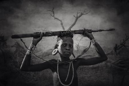 Young Mursi warrior