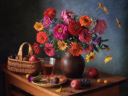 Still life with flowers and fruits