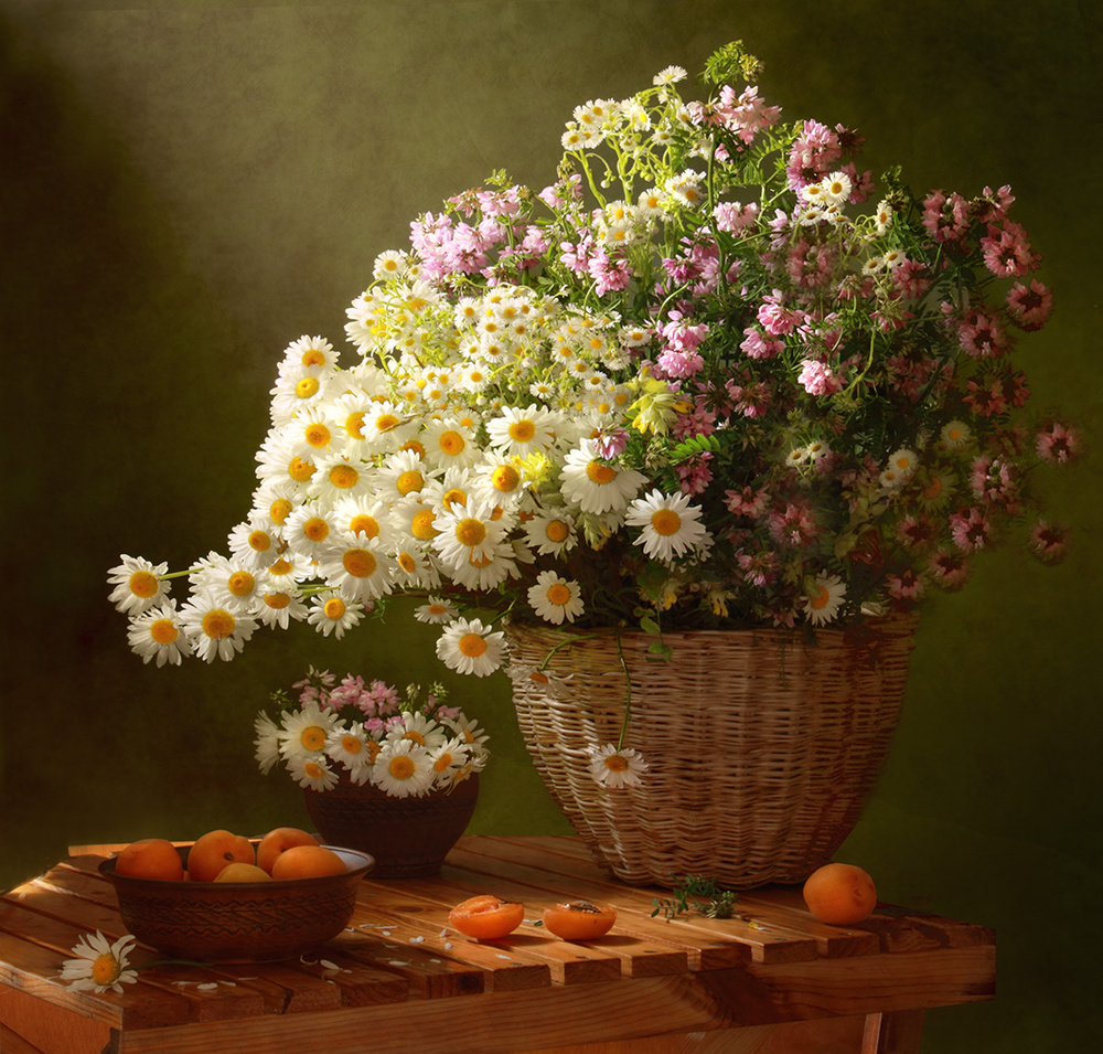 Still life with a basket of wildflowers von Tatyana Skorokhod