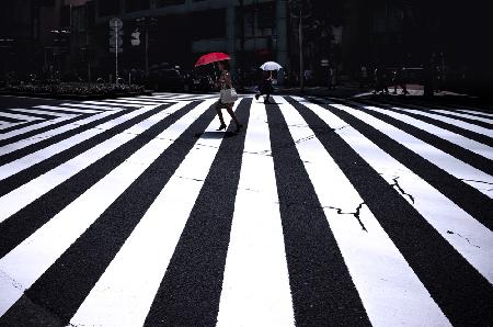 Red and white parasols