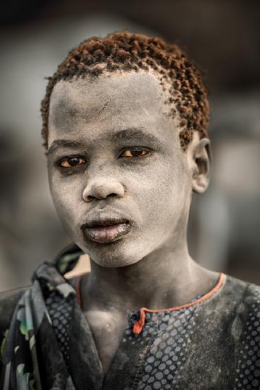 Mundari herds boy