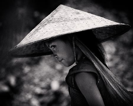 girl with hat wandering