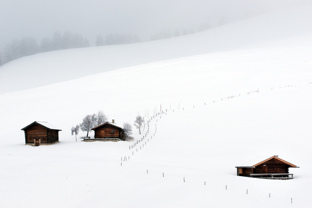 Three huts, snow von Vito Miribung